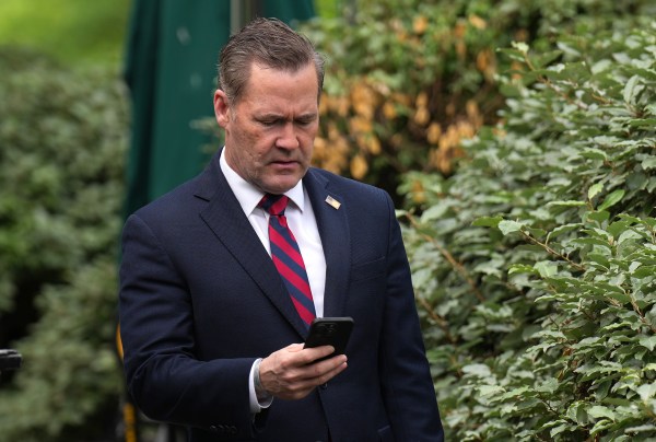 Mike Waltz, who is leaving his role as national security adviser and moving to a position as ambasssador to the United Nations, looks at his phone as he prepares for a TV interview at the White House on May 1, 2025, in Washington, D.C. (Photo by Andrew Harnik/Getty Images)