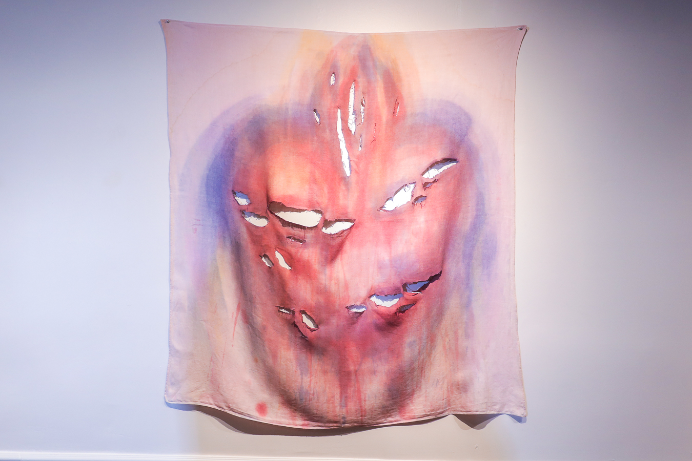"Behold This Heart," 2023, by Erin K. McAtee. Fabric dye and pigment on found fabric. (Photo by Edwin Lucero)