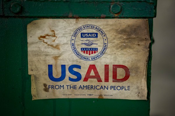 The USAID logo is seen on a machine that processes recycled plastic into construction blocks at the Pasig Eco Hub, a project impacted by the Trump administration's freeze on foreign aid, on March 10, 2025 in Pasig, Metro Manila, Philippines. (Photo by Ezra Acayan/Getty Images)