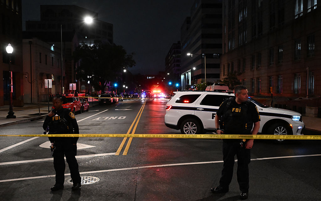 FBI agents cordon off the scene outside the Capital Jewish Museum following a shooting that left two people dead. (Photo by ALEX WROBLEWSKI/AFP via Getty Images)