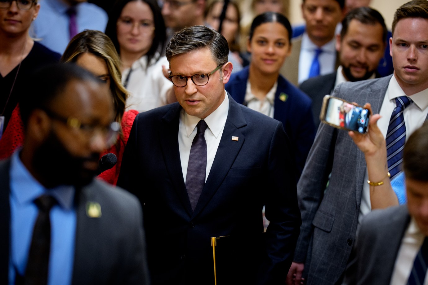 Speaker of the House Mike Johnson speaks to reporters as he heads to a news conference following a House Republican conference meeting at the on May 6, 2025, in Washington, D.C. (Photo by Andrew Harnik/Getty Images)