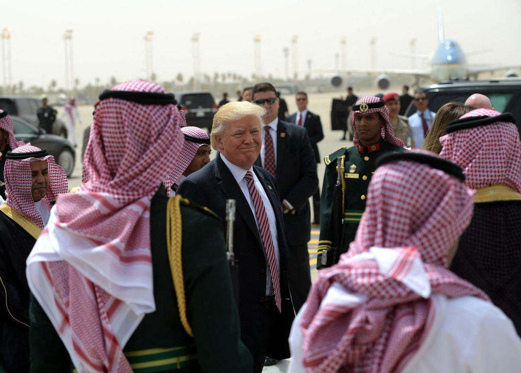 President Donald Trump makes his way to board Air Force One in Riyadh on May 22, 2017. (Photo by MANDEL NGAN/AFP via Getty Images)