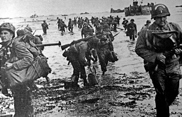 American soldiers go ashore during the Normand landing operations on D-Day, June 6, 1944. (Photo by Universal History Archive/Universal Images Group/Getty Images)
