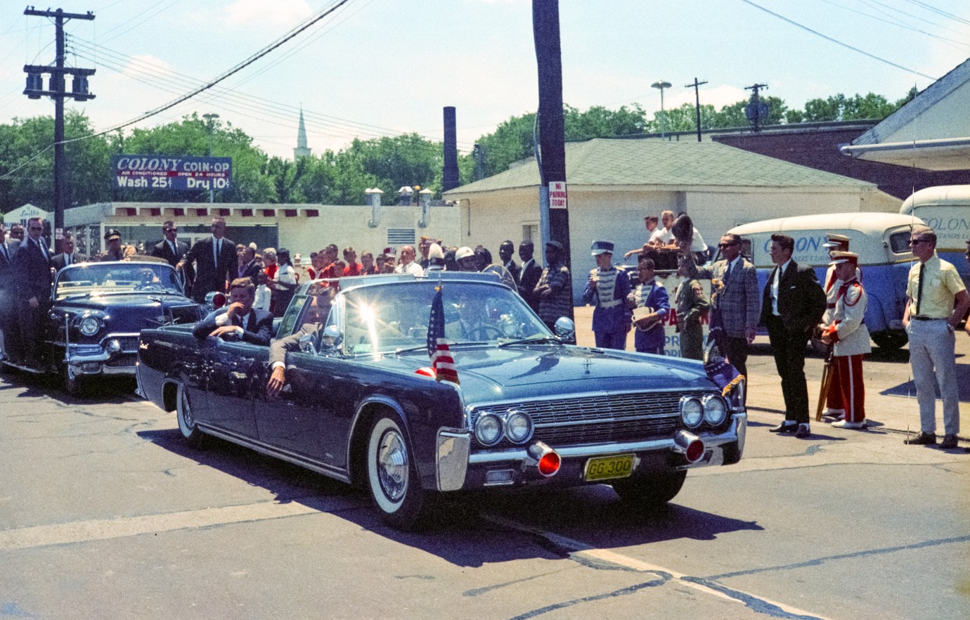President John F. Kennedy in a 1961 Lincoln Continental. (Photo by D. Lentz/Getty Images)