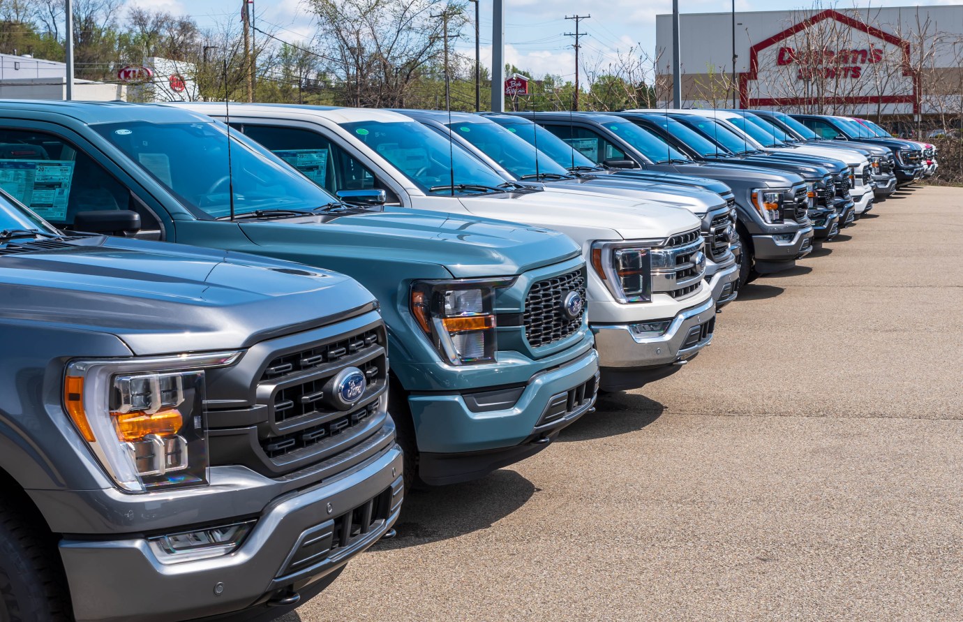 A line of new Ford trucks at dealership in Pennsylvania in 2023. (Photo via Althom/Getty Images)