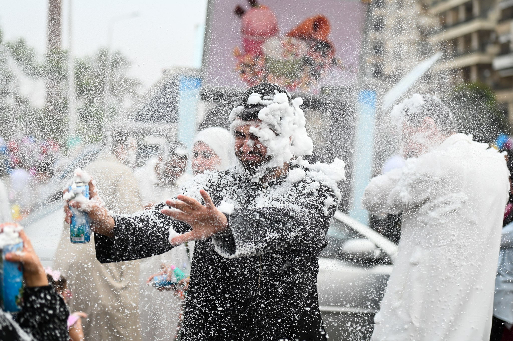 Egyptian Muslims celebrate Eid al-Adha after prayer at Abu Bakr Al-Siddiq Mosque on June 6, 2025, in Cairo. Eid al-Adha is the second of the two main festivals in Islam alongside Eid al-Fitr, with celebrations running from June 6-10. (Photo by Sayed Hassan/Getty Images)
