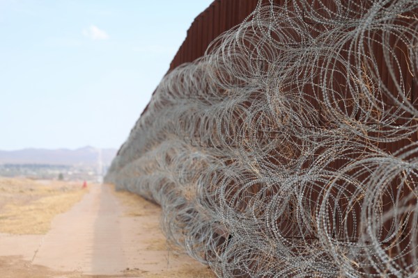 Concertina wire is attached along the fence at the U.S. border with Mexico,in Douglas, Arizona, on April 3, 2025. (Photo by David Swanson/AFP via Getty Images)