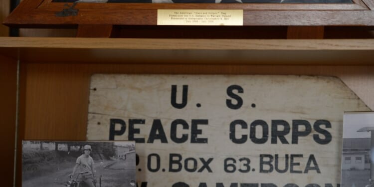 An old picture of former Ambassador Christopher Hill on a motorcycle while in the Peace Corps in Cameroon. (Photo by Helen H. Richardson/The Denver Post via Getty Images)