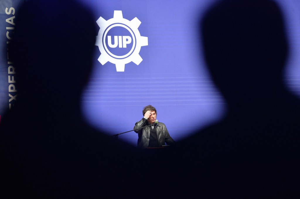 Argentina’s President Javier Milei gives a speech during a meeting with young people from the Industrial Entrepreneurs Forum of Paraguay (FEIP) organized by the Paraguayan Industrial Union (UIP) at the headquarters of the National Secretary of Sports in Asuncion on September 16, 2025. (Photo by Daniel DUARTE / AFP) (Photo by DANIEL DUARTE/AFP via Getty Images)