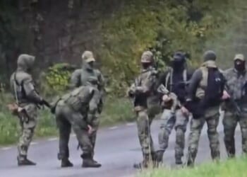 Unusual Appearance Of Armed 'Mystery' Russian Men On Estonia's Border Raises NATO Alarm