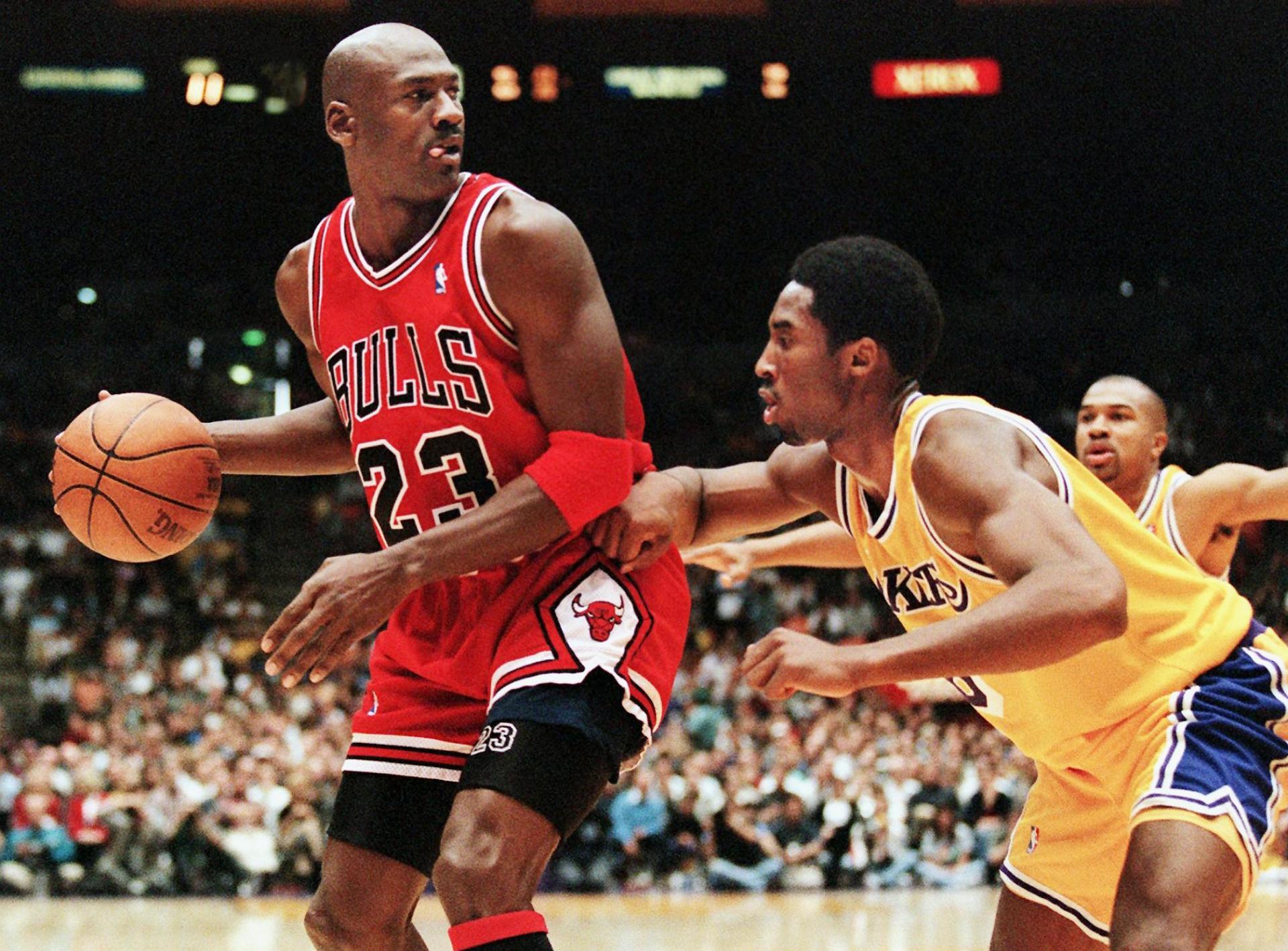 A basketball player dribbling a basketball