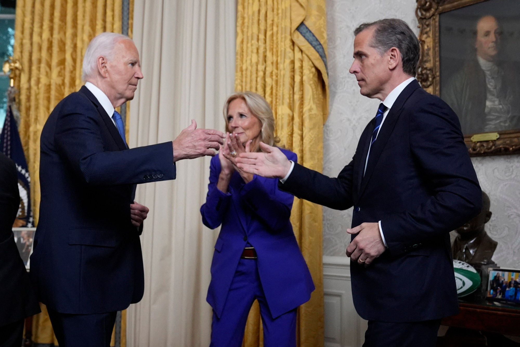 A group of people in suits