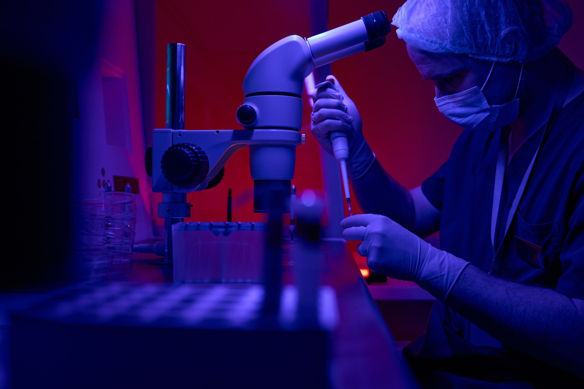 A person using a microscope