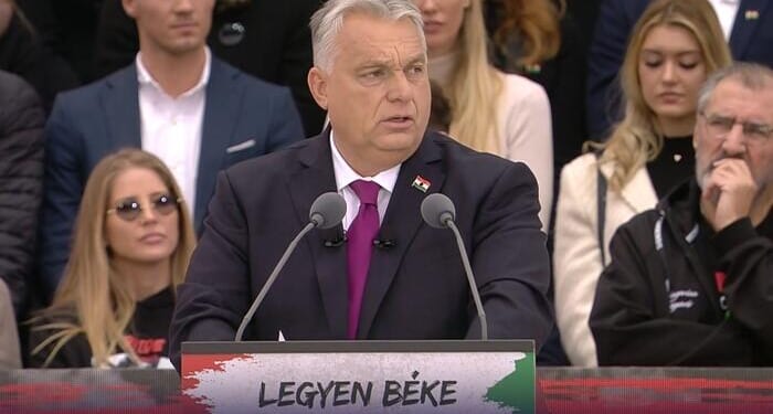 Orbán Vows Hungary Will Remain 'Island Of Peace' And 'Migrant-Free' As He Likens Brussels To Soviet Oppressors