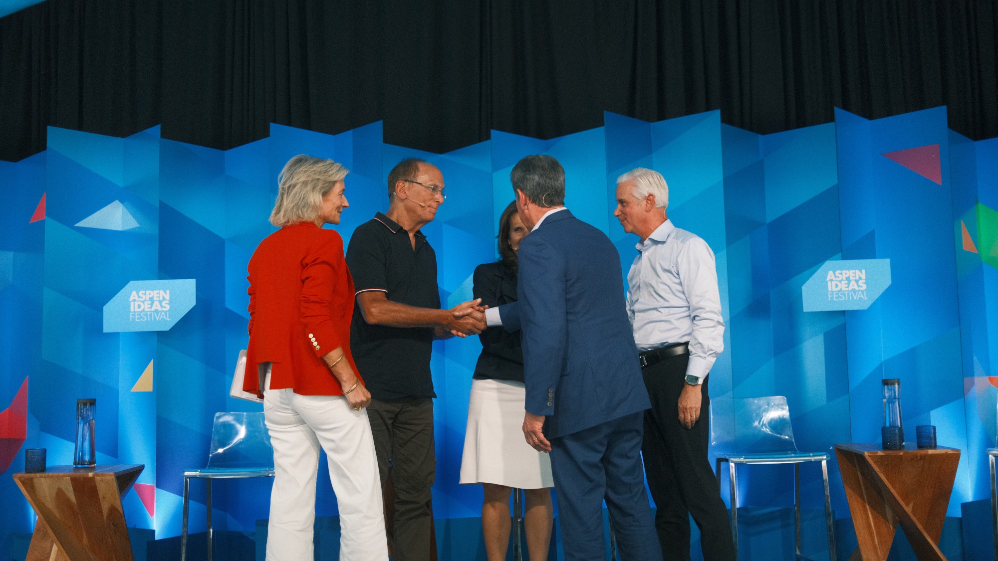 A group of people shaking hands