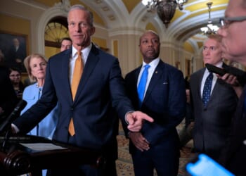 A group of men in suits