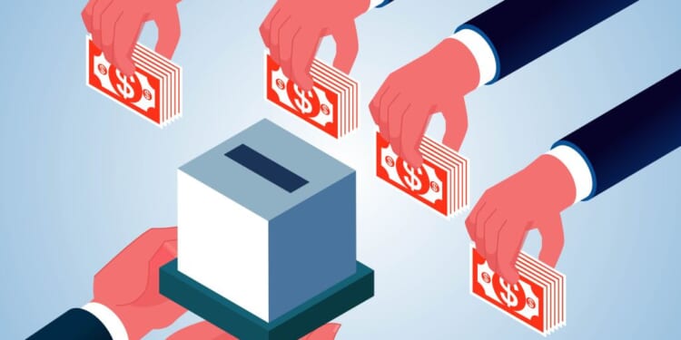 A group of hands holding money