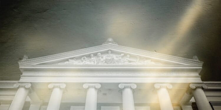 Illustration by Noah Hickey/The Dispatch (Photo via Getty Images).