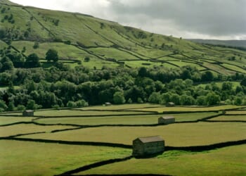 Fields divided by dry stone walls in the Yorkshire Dales National Park. (Photo by Tom Stoddart/Getty Images)