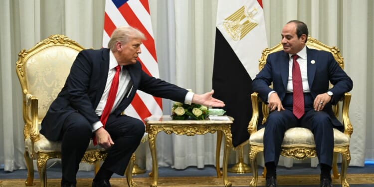 Two men sitting in chairs