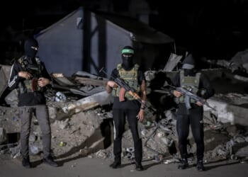 A group of people holding guns
