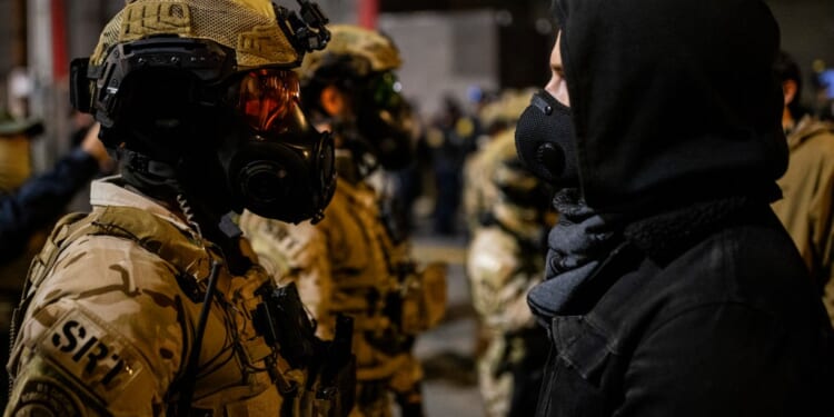 A group of people wearing masks