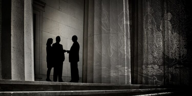 A group of people standing on steps