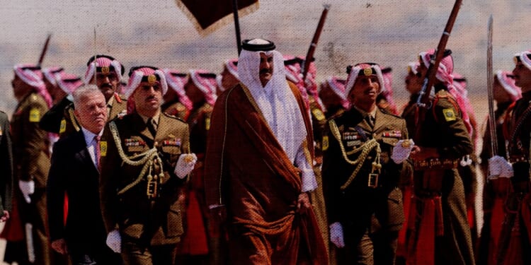 The Emir of Qatar Sheikh Tamim bin Hamad Al Thani (center) is welcomed by Jordan’s King Abdullah II (L) at Marka airport on September 17, 2025 in Amman, Jordan. (Photo by Salah Malkawi/Getty Images)
