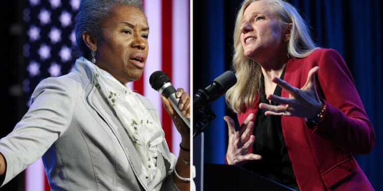 A woman speaking into a microphone