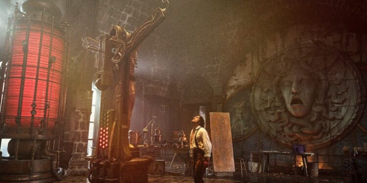 A man standing in front of a tree