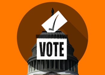 A white building with a check mark on top