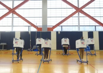 People in a room with boxes