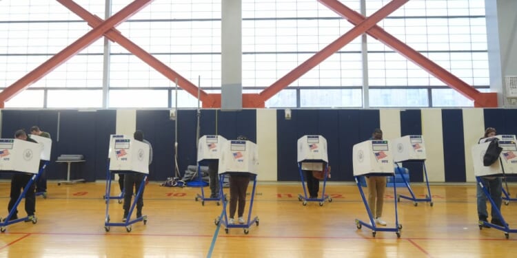People in a room with boxes