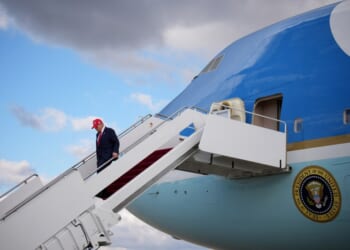 A man walking up a plane