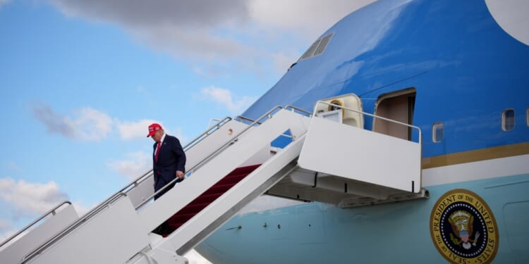 A man walking up a plane