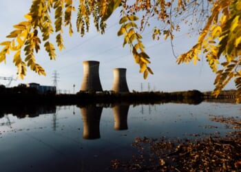 Two massive cooling towers being rehabilitated for nuclear powe