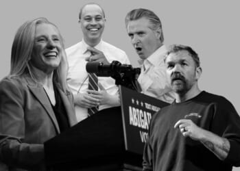 A group of people standing at a podium