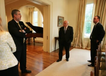 A group of men in suits