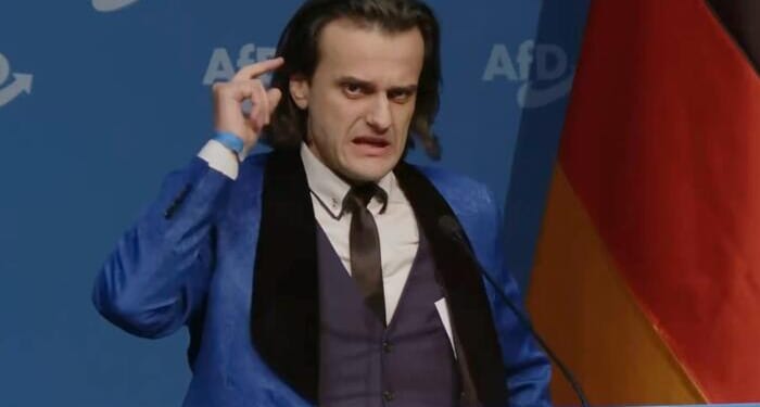 Undercover Agent? Left-Wing Satirist? Questions Swirl After Fiery 'Hitler-Like' Speech At AfD Youth Congress