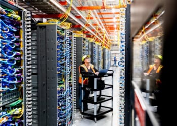 A technician works at an Amazon Web Services AI data center in New Carlisle, Indiana on October 2, 2025. (Photo by Noah Berger/Getty Images via Amazon Web Services)