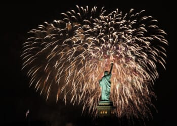 Fireworks light up sky over Statue of Liberty during New Year celebrations