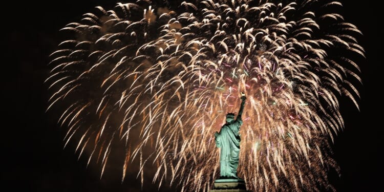 Fireworks light up sky over Statue of Liberty during New Year celebrations