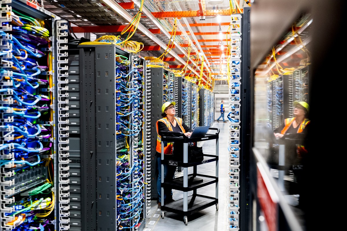 A technician works at an Amazon Web Services AI data center in New Carlisle, Indiana on October 2, 2025. (Photo by Noah Berger/Getty Images via Amazon Web Services)