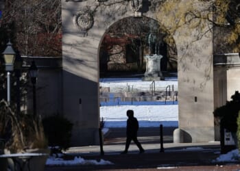 Students killed in Brown University shooting identified as search continues for suspect