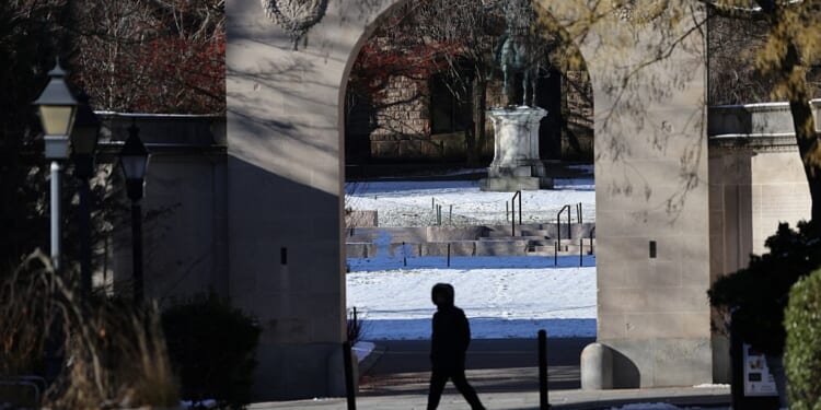 Students killed in Brown University shooting identified as search continues for suspect