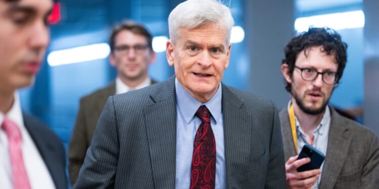 Sen. Bill Cassidy, R-La., speaks to reporters as he arrives in the U.S. Capitol for a vote on Wednesday, December 3, 2025. (Bill Clark/CQ-Roll Call, Inc via Getty Images)