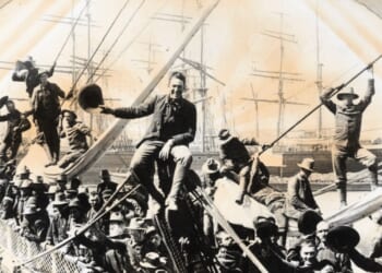 Volunteer soldiers smile for a portrait on the deck of the transport ‘Rio de Janiero’, as it leaves for Manila during the Spanish-American War, from San Francisco Bay, circa 1898. (Photo by Archive Photos/Getty Images)