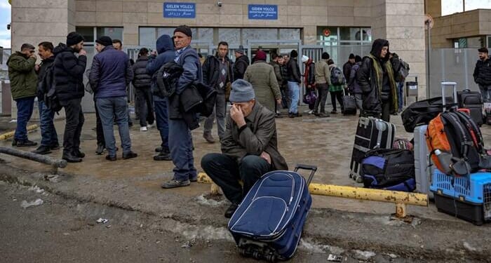 Iranians Seal Windows & Store Food, Water As They Prepare For Attack