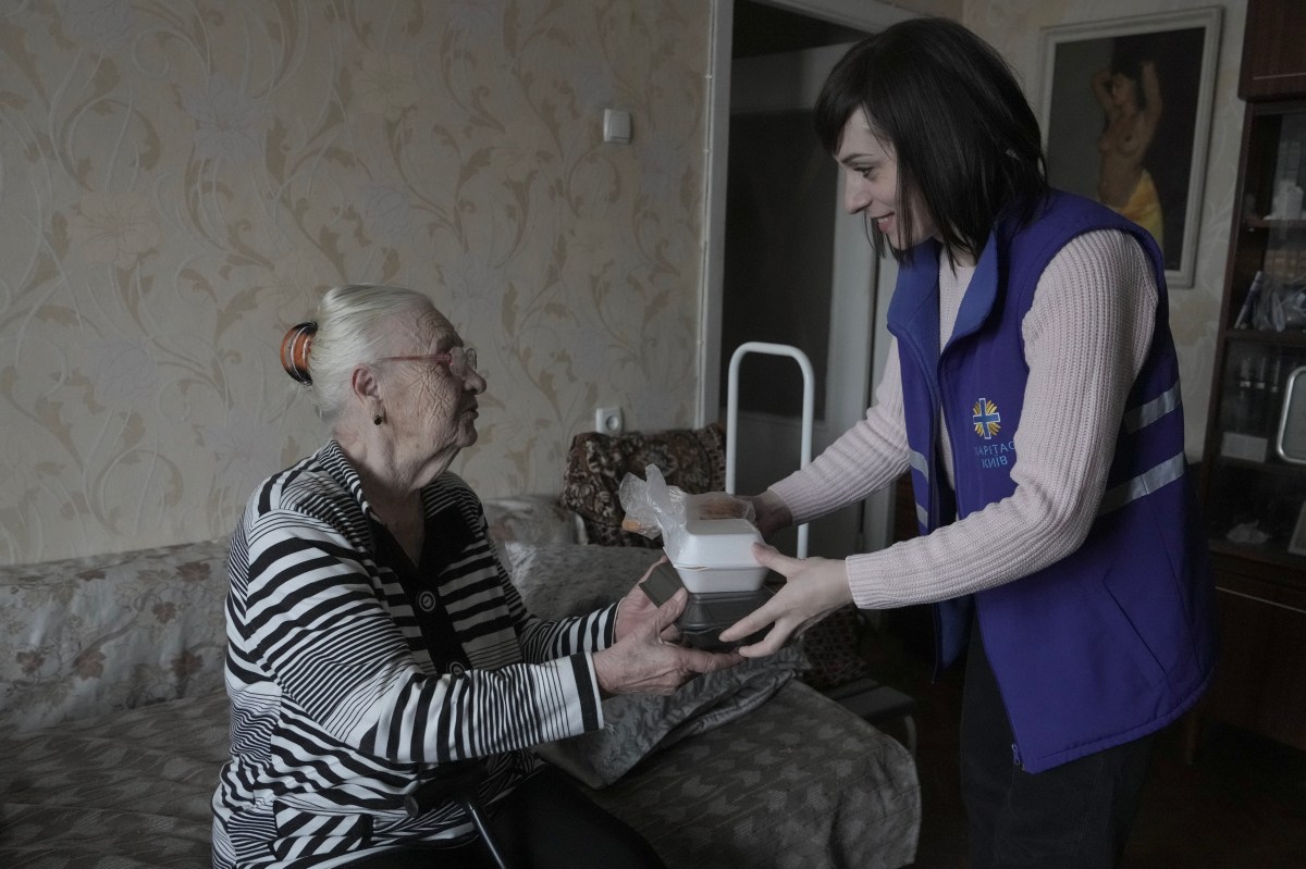Volunteers Of International Charitable Foundation ‘Caritas Ukraine’ Distribute Hot Food To Local People At Social Center In Kyiv
