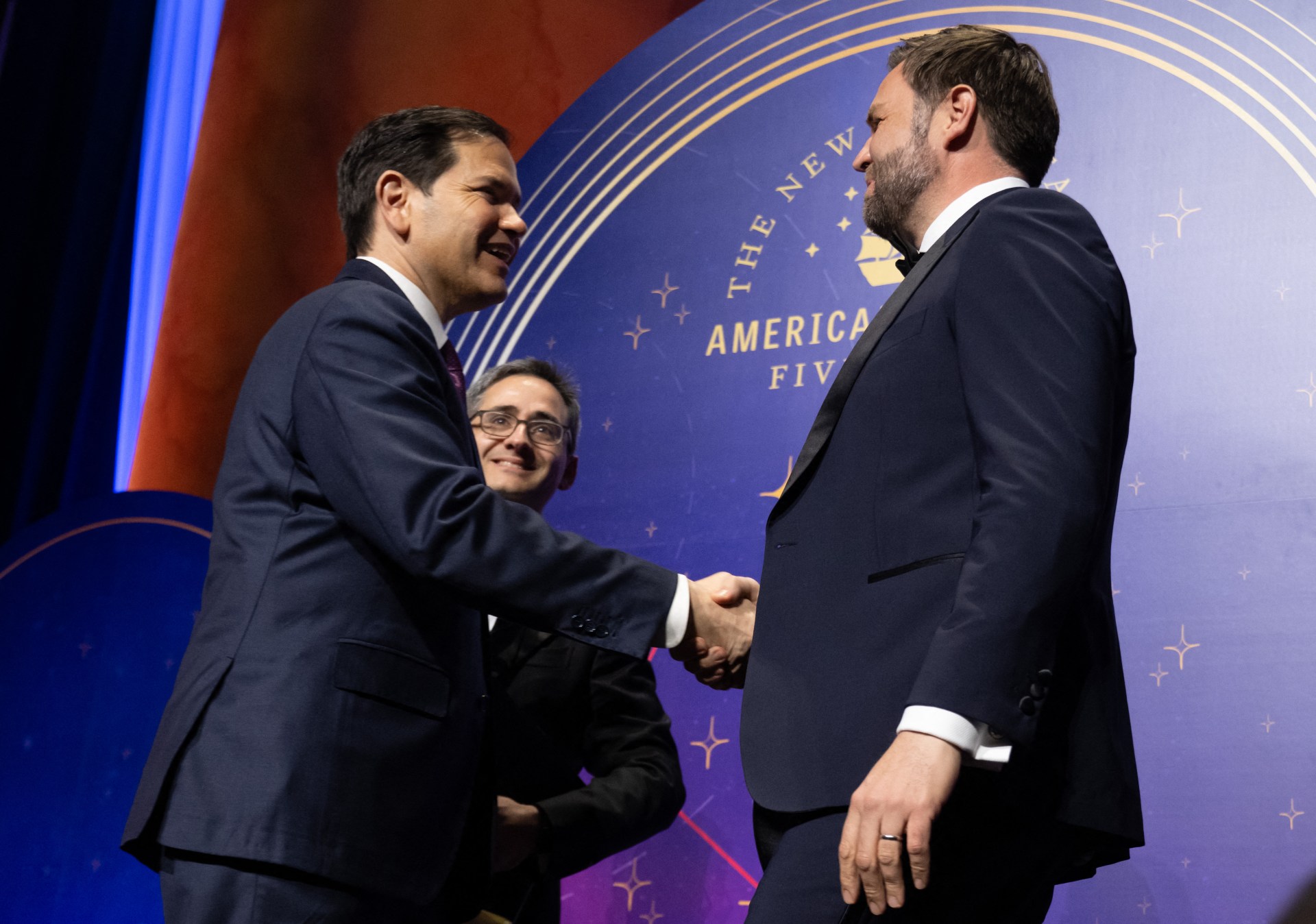 Vice President J.D. Vance and Secretary of State Marco Rubio shake hands during the American Compass Fifth Anniversary Gala at the National Building Museum in Washington, D.C., on June 3, 2025. (Photo by Saul Loeb/AFP via Getty Images)